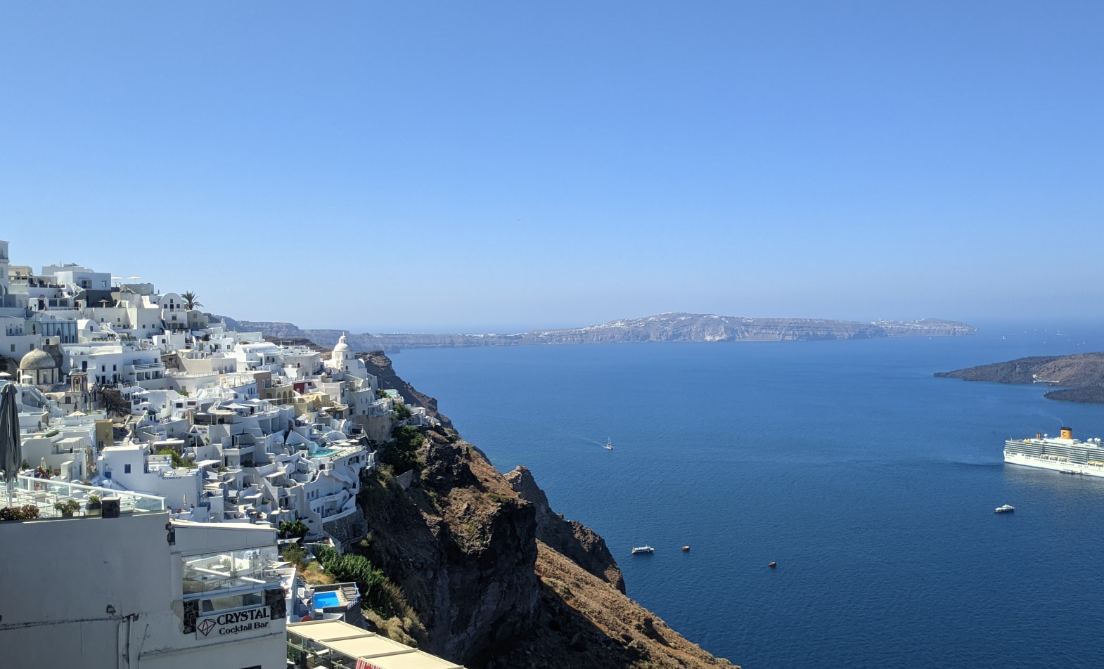 Santorini Sunset Spots Oia - Caldera View from Oia Cliffside at Golden Hour