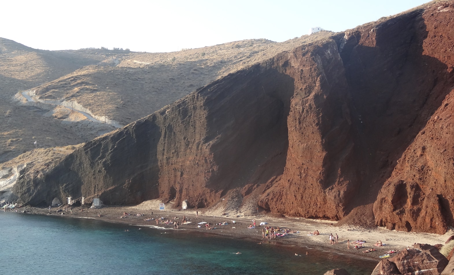 Santorini Highlights - Perissa Black Sand Beach with Mesa Vouno Rock in Background